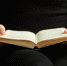book-in-the-hands-of-a-man-on-a-black-background_219728-5482 - Министерство культуры